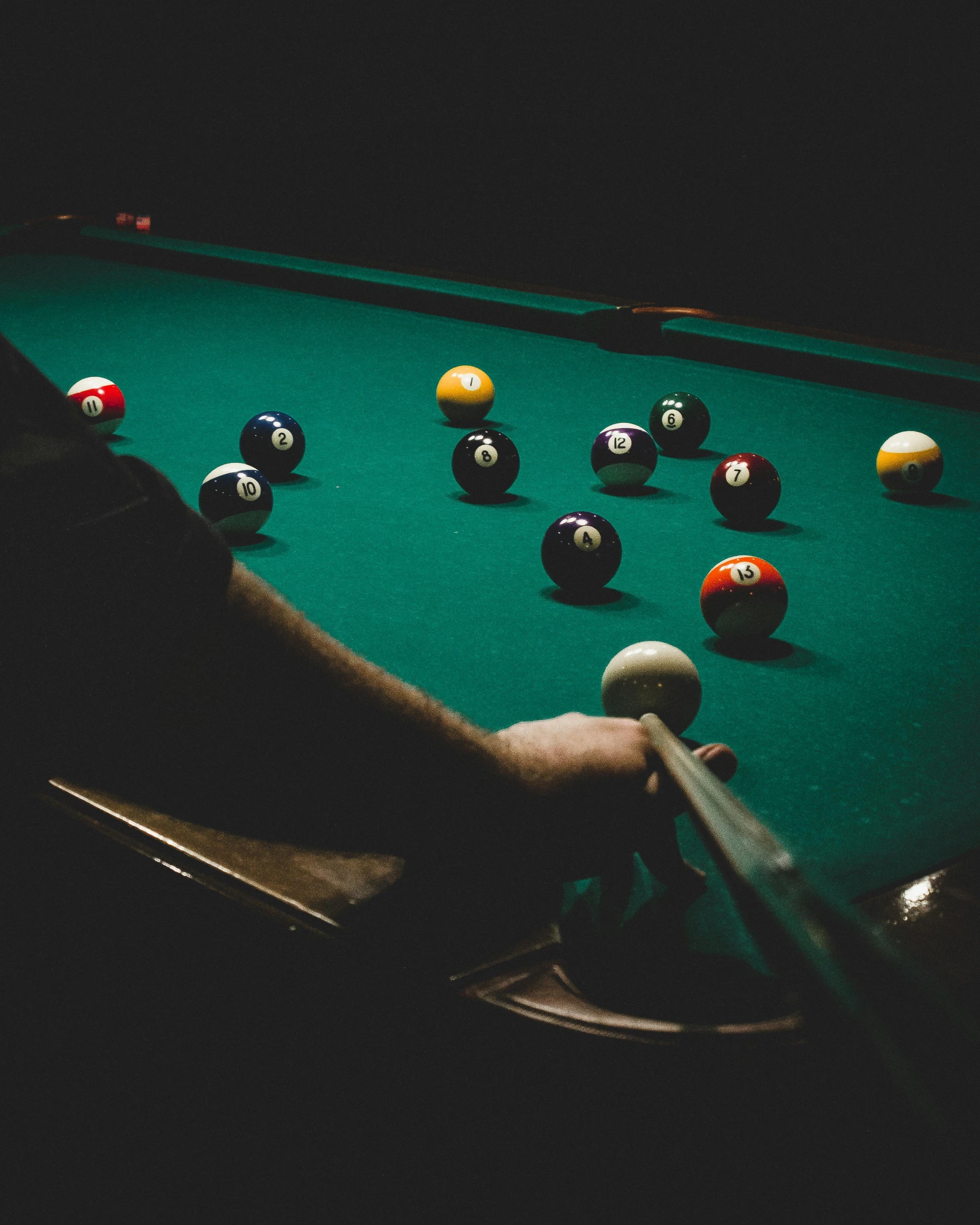 a pool table with a lot of balls on it