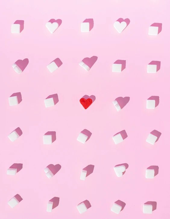 a square and heart shaped object next to each other