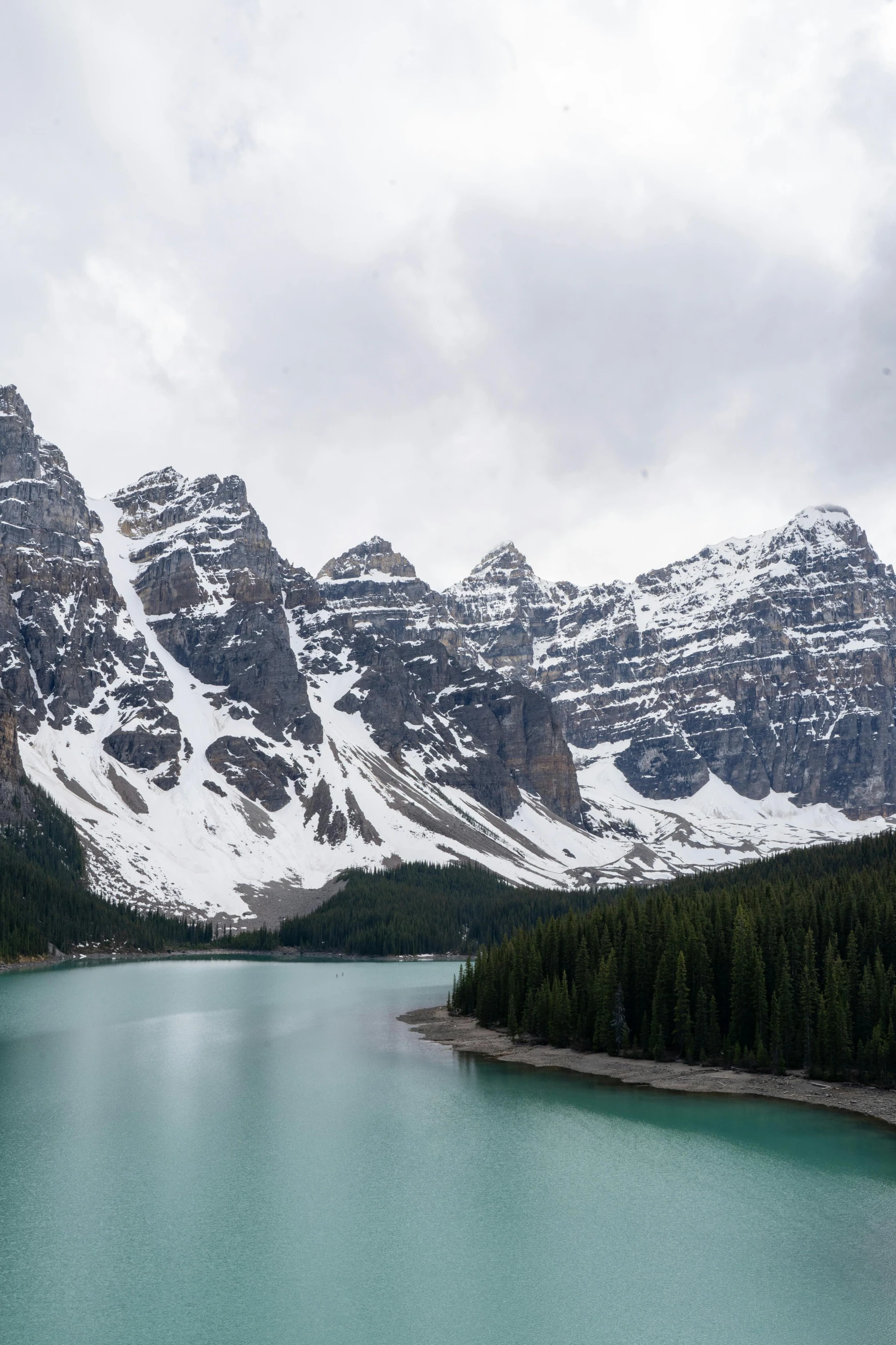 mountains surrounding the mountain lake in winter