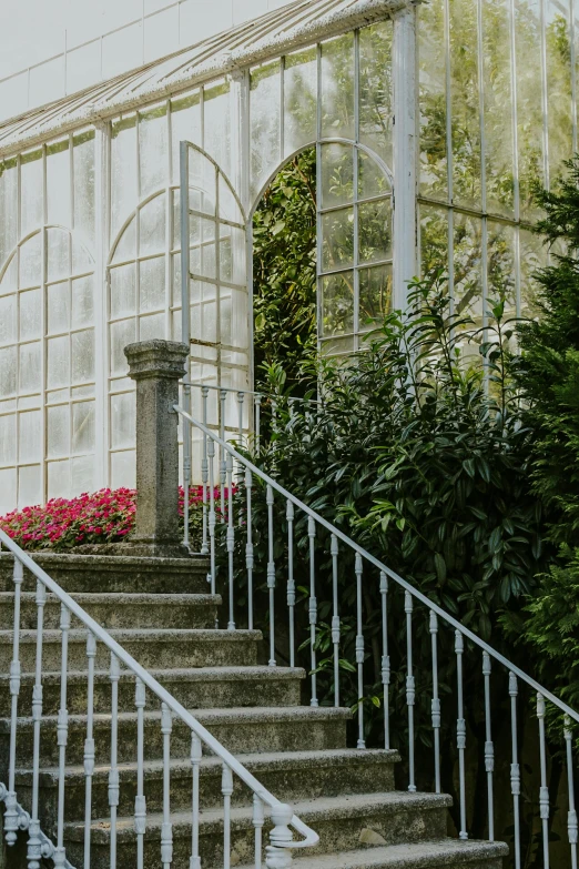 there are stairs that lead to a large building