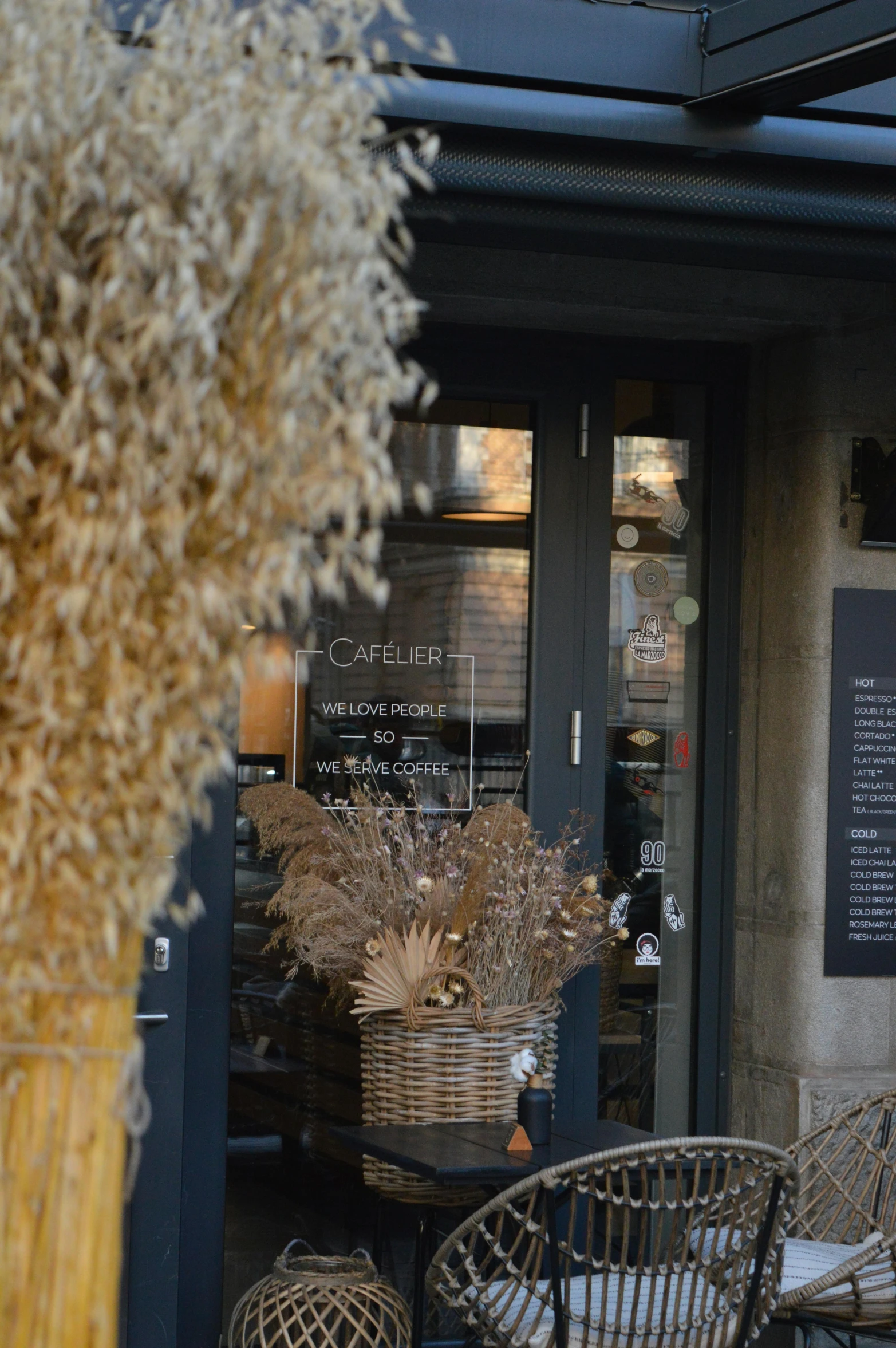 a restaurant patio area has a chair and a table