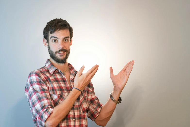 a man making a stop sign with his hands