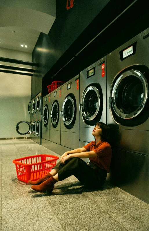 a woman with her head back in the washer