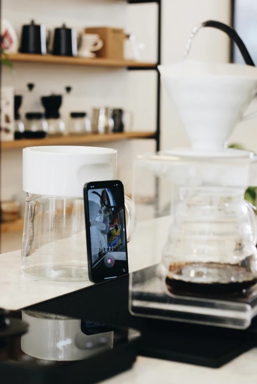 a small phone sitting on top of a tabletop