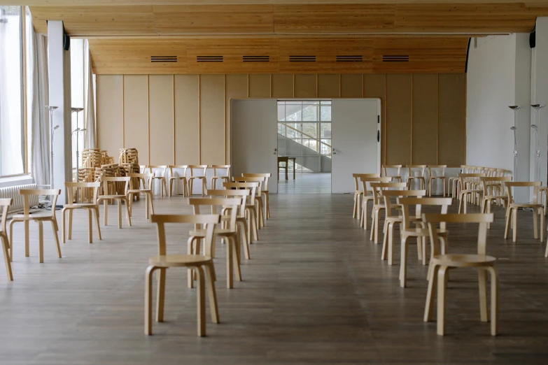 chairs that are set up for a formal dinner