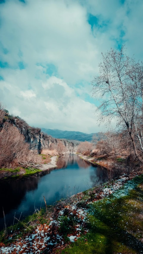 an autumn view of a body of water