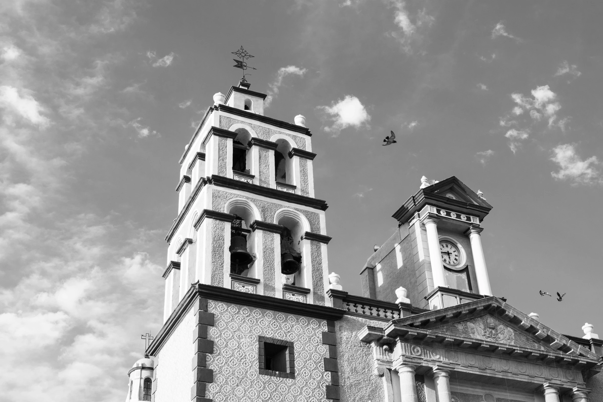 a very tall tower with a clock on the top