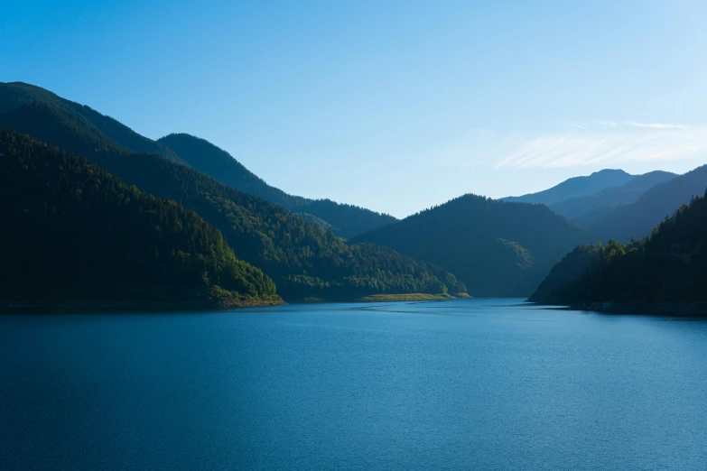 a lake with lots of water and mountains