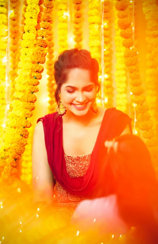 a woman sitting on the ground and laughing