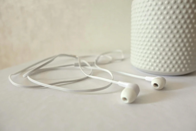 an earphones that are sitting next to each other