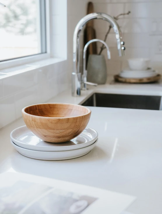 a bowl is sitting on a white plate