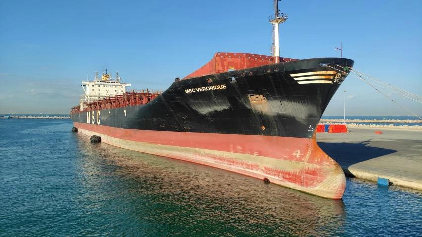 a large ship in the middle of a body of water