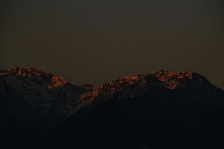 the view of mountains in night from a distance