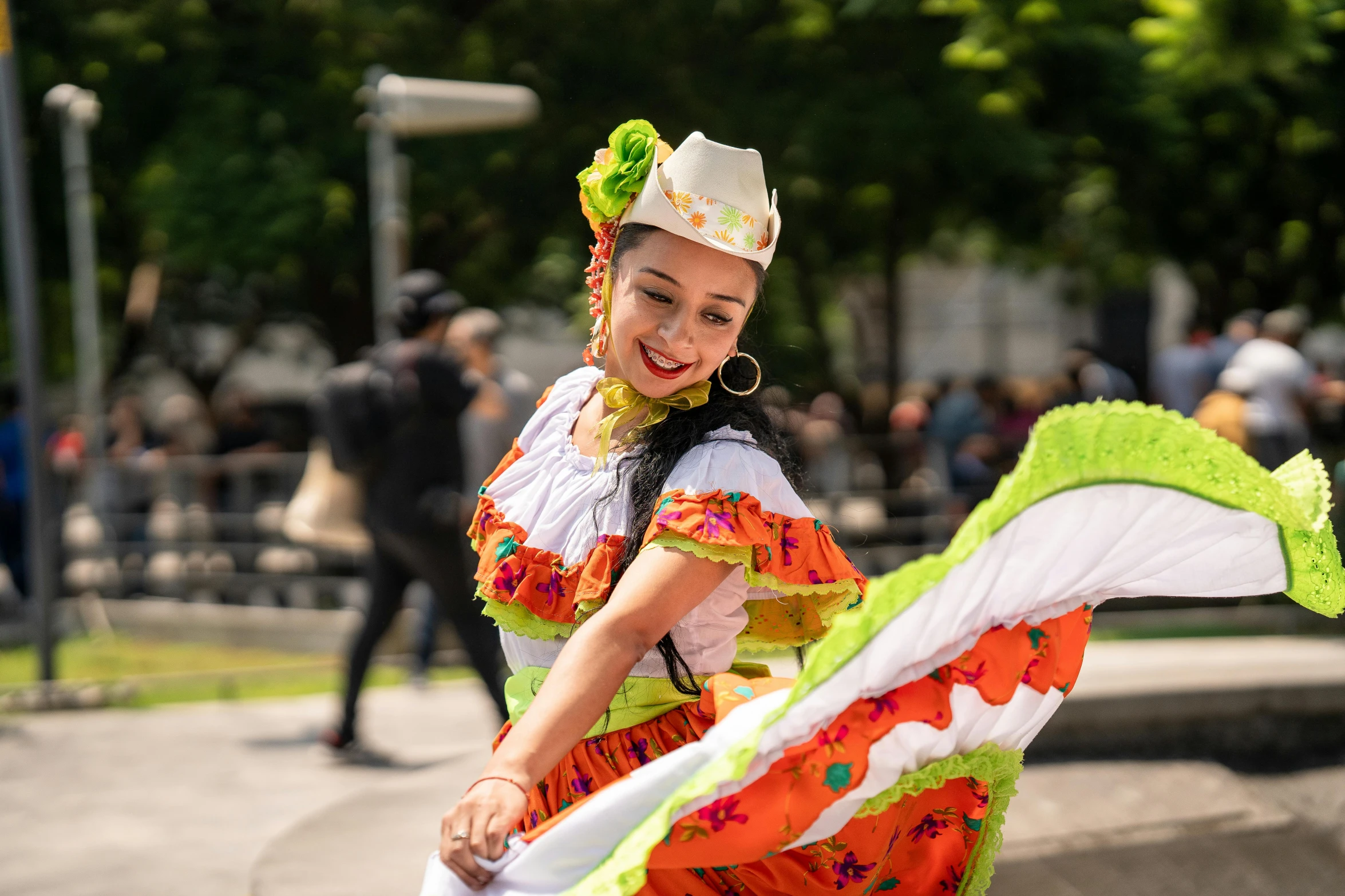 a woman is dressed in colorful costume