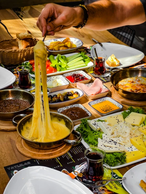 this is an image of several bowls and food on the table