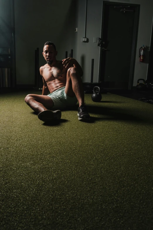 a person sitting on the floor in a room