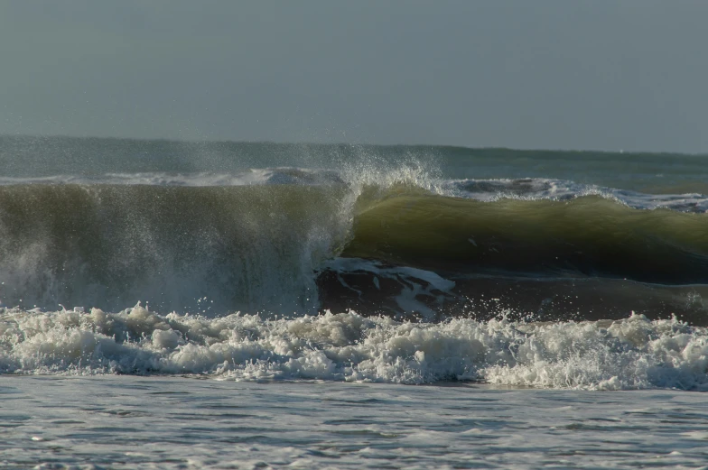 the wave is approaching a body of water