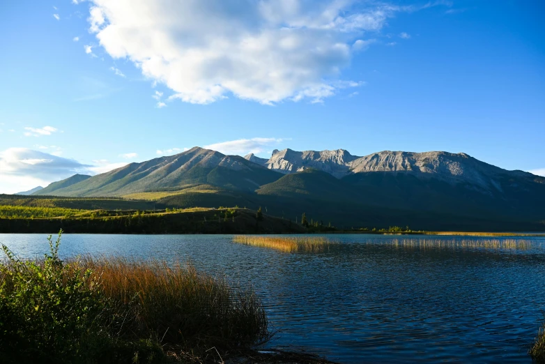 a lake with a mountain behind it