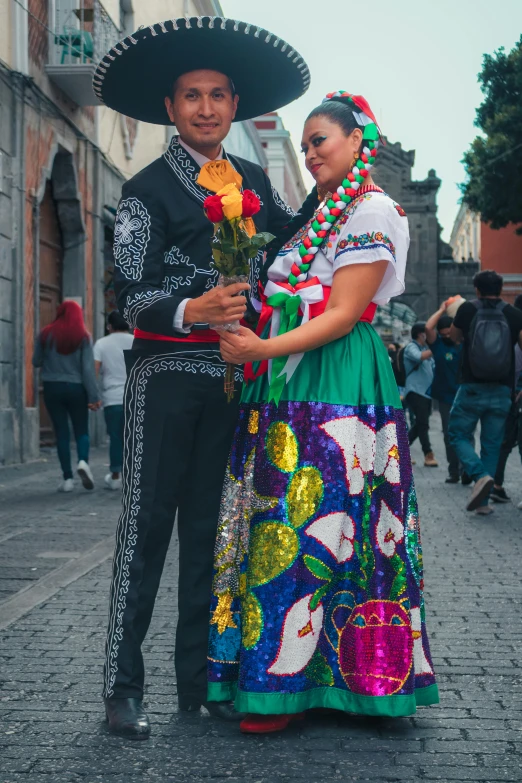 couple in folk clothing at the day party