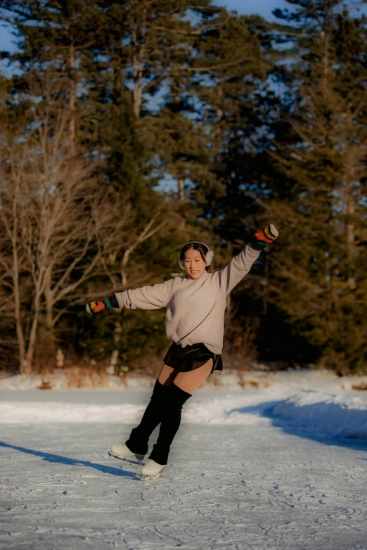 a girl in the snow riding on a board