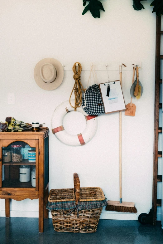 there are some objects on the wall near a basket