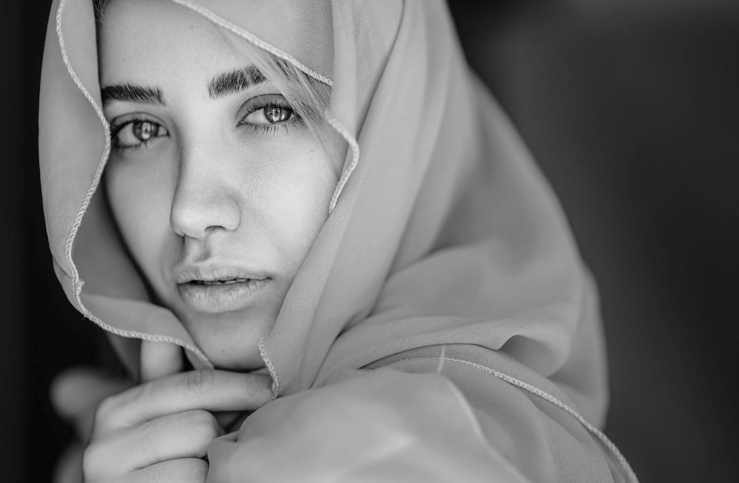 a woman wearing a scarf on her head