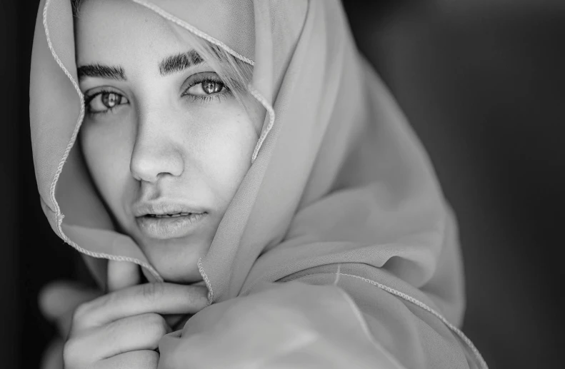 a woman wearing a scarf on her head