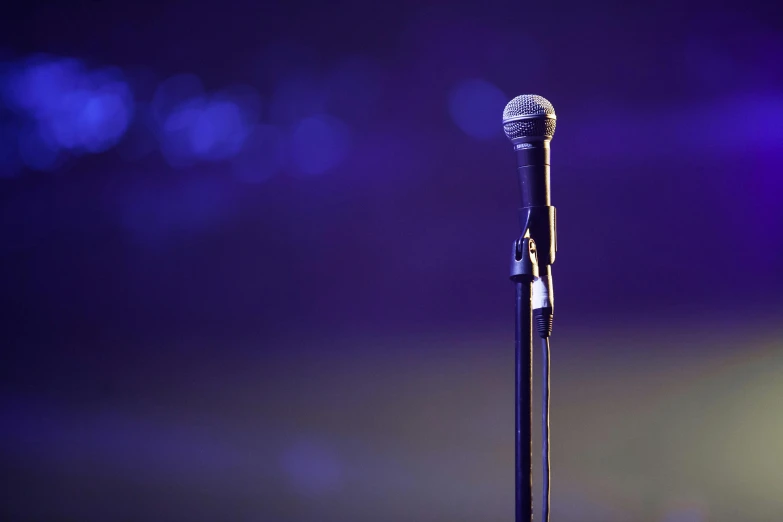 a microphone on a stand is set up for an event