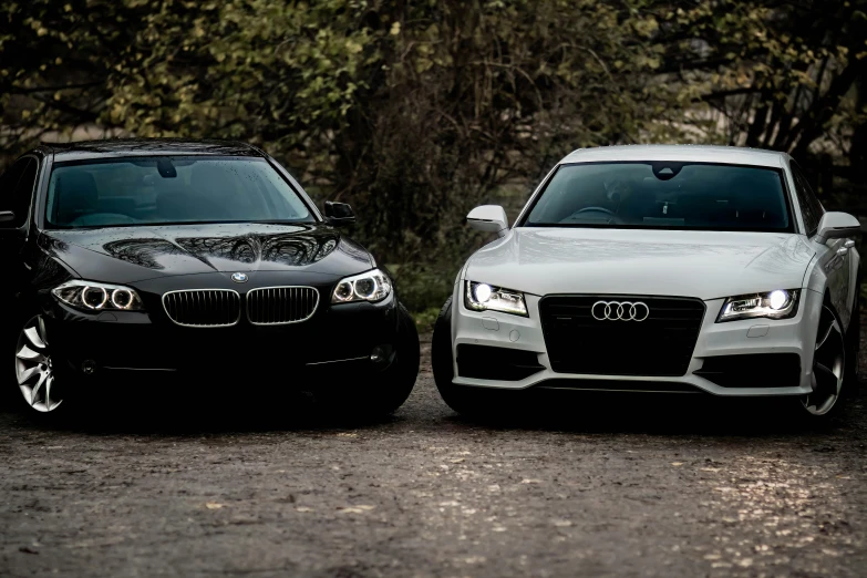 two cars side by side with an image of the same car