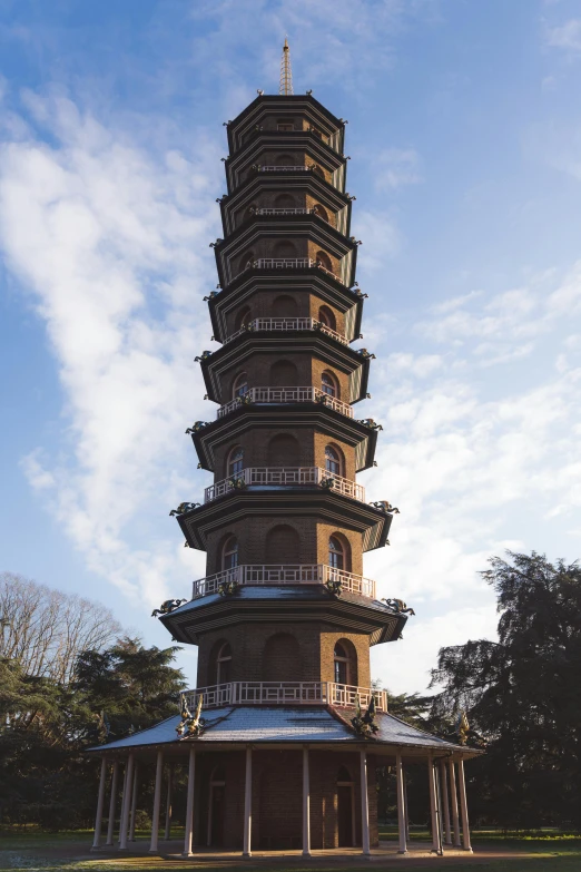 a tall tower with multiple levels made of bricks