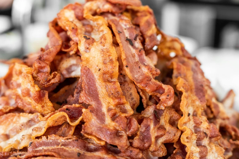 a pile of bacon pieces is shown close up