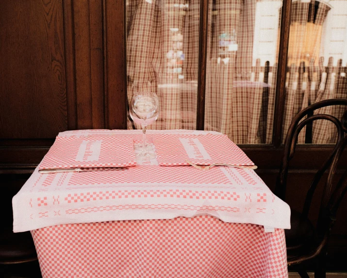 a close up of a table with a sign on it