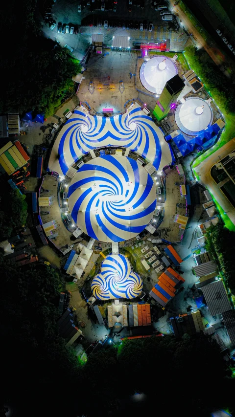 the view from the top of an airplane shows some large circles on the ground