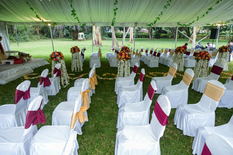 rows of chairs that have been set up in an open area