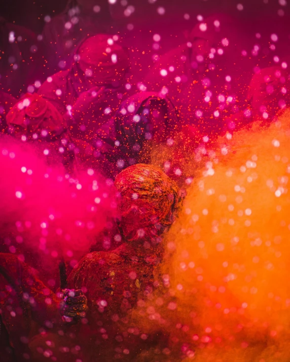 colorful powdered objects against a black background