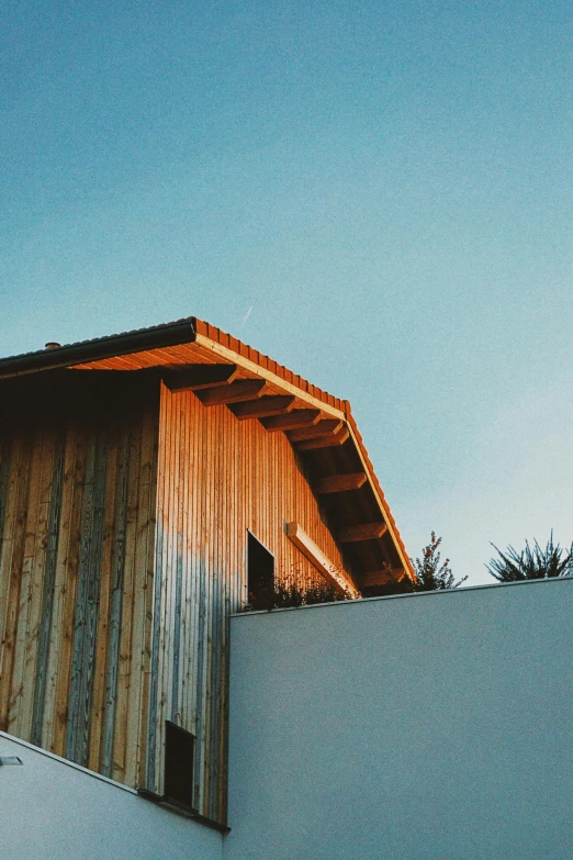 an orange structure is on top of a building