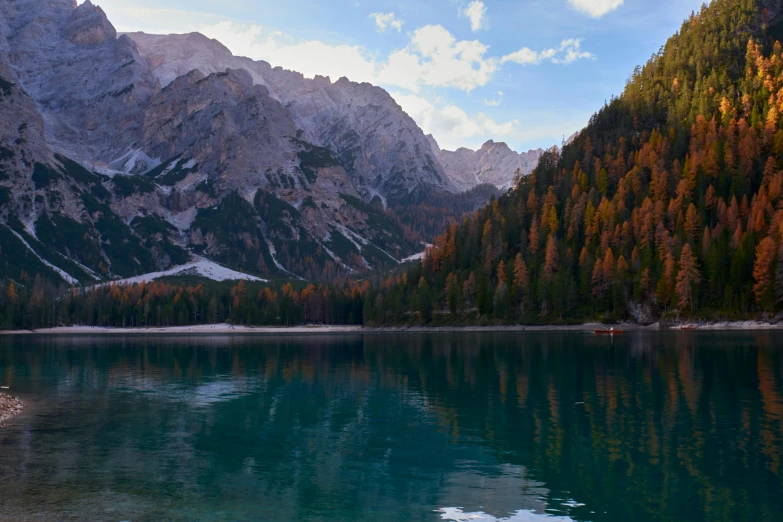 a body of water near some mountains