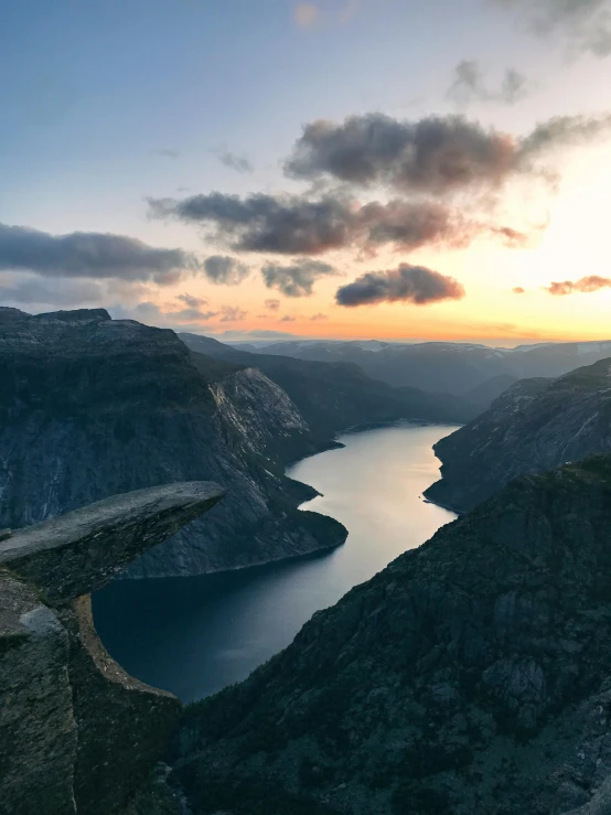 the view of an expansive mountainous river valley from high in the mountain