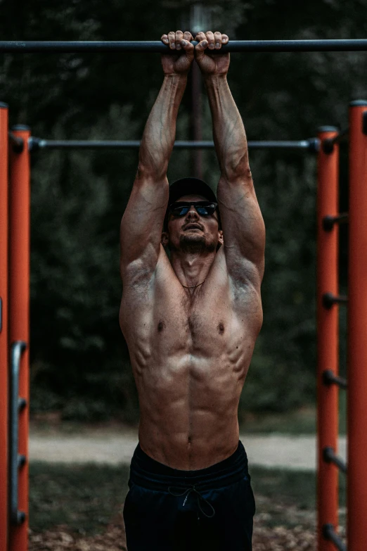 a man with a body board standing over his head