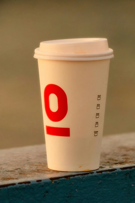 an image of a cup with the word nine written on it