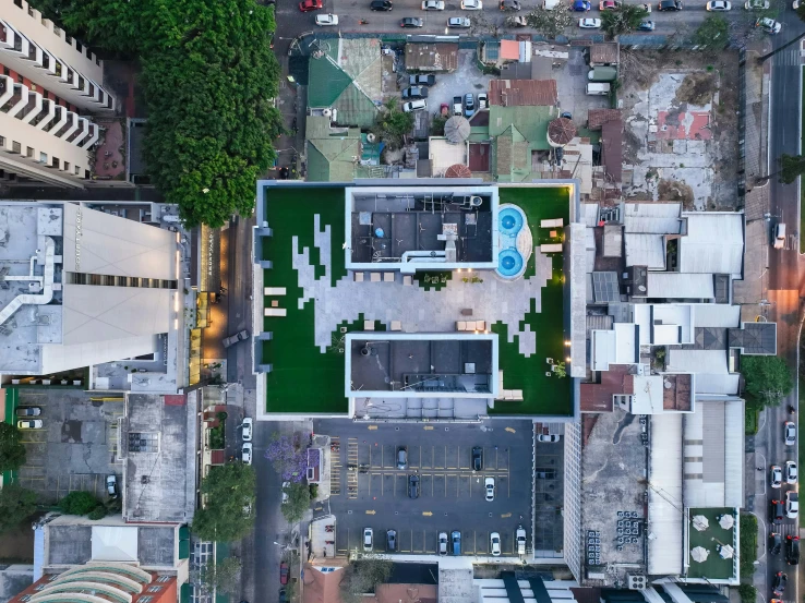 an overhead view of the back of an apartment building