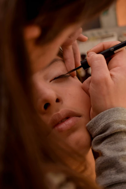 a woman uses her phone to look at the scenery