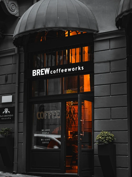 an exterior s of brew coffee works in the rain