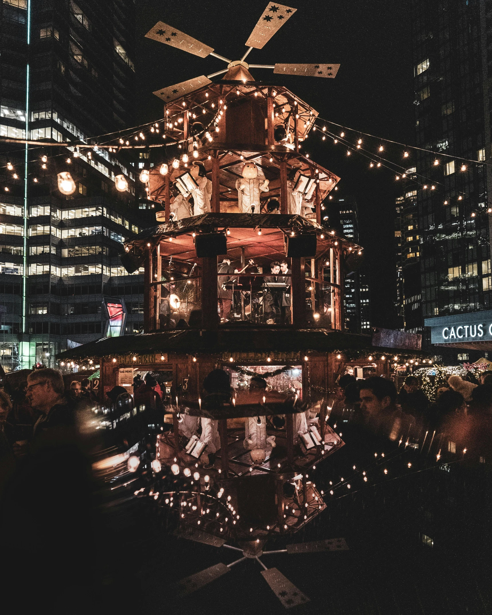 a building has lights around it and a clock