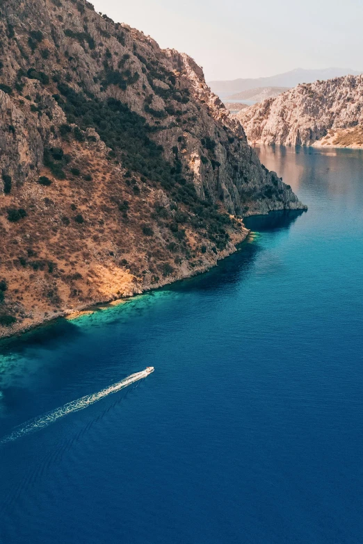 an ocean with boats in the blue water