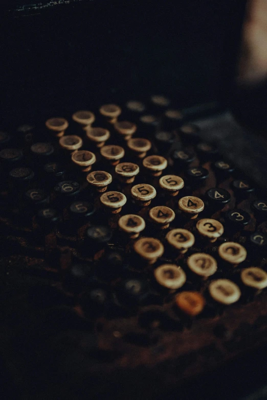 closeup of an old typewriter, taken in the dark