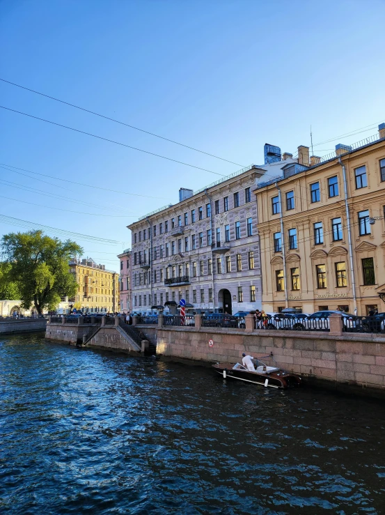 the river runs under some old buildings