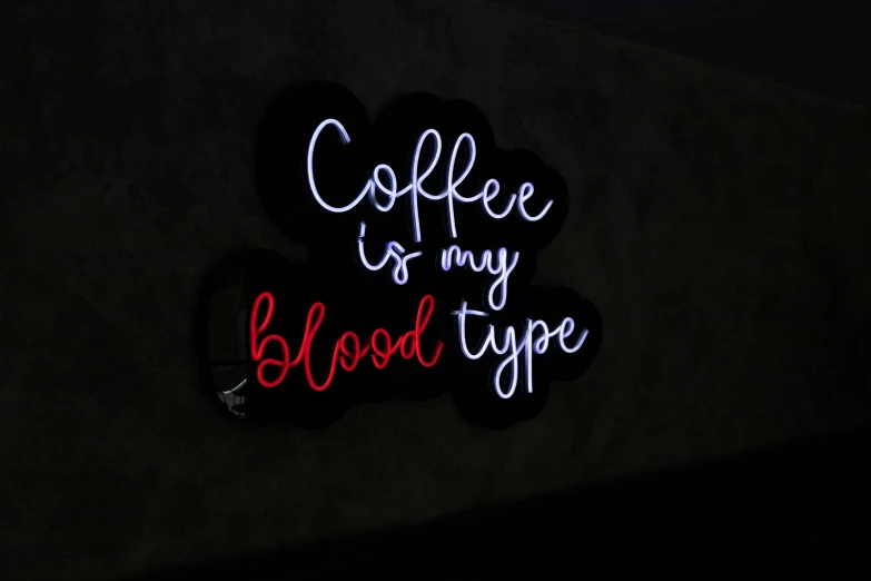 a sign with the words coffee is my  type on it