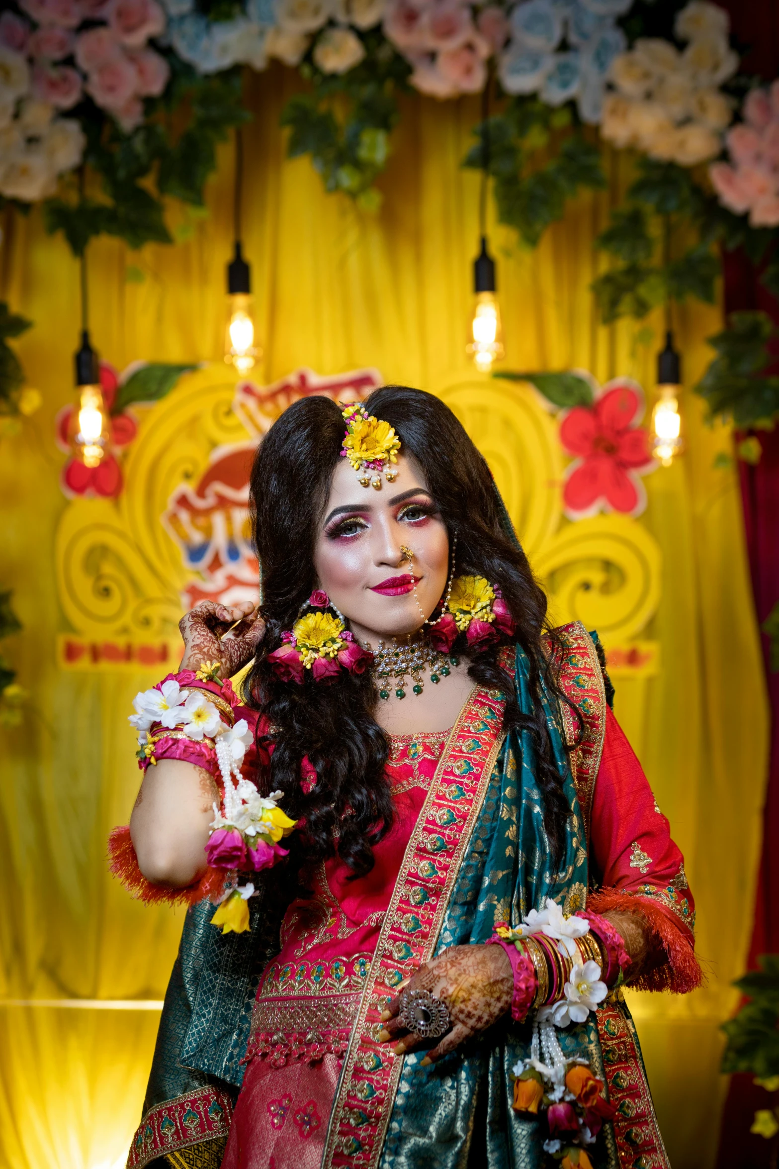 a woman with flowers in her hair and a yellow flower on her chest