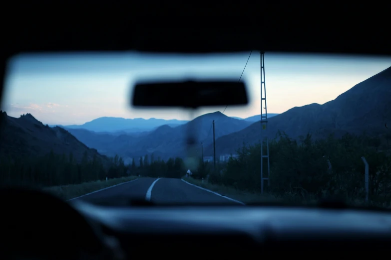 a view from inside a car from the rear seat